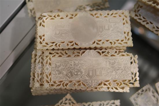 A part set of 56 19th century Chinese mother of pearl gaming counters, in four sizes, Largest 2.75in.